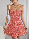 The cami dress with small flower prints a backless design and thin